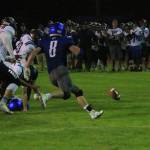 Bodie Hezel (8) hustles to a Sultan fumble.(Photo by Jim Waller/South Whidbey Record)