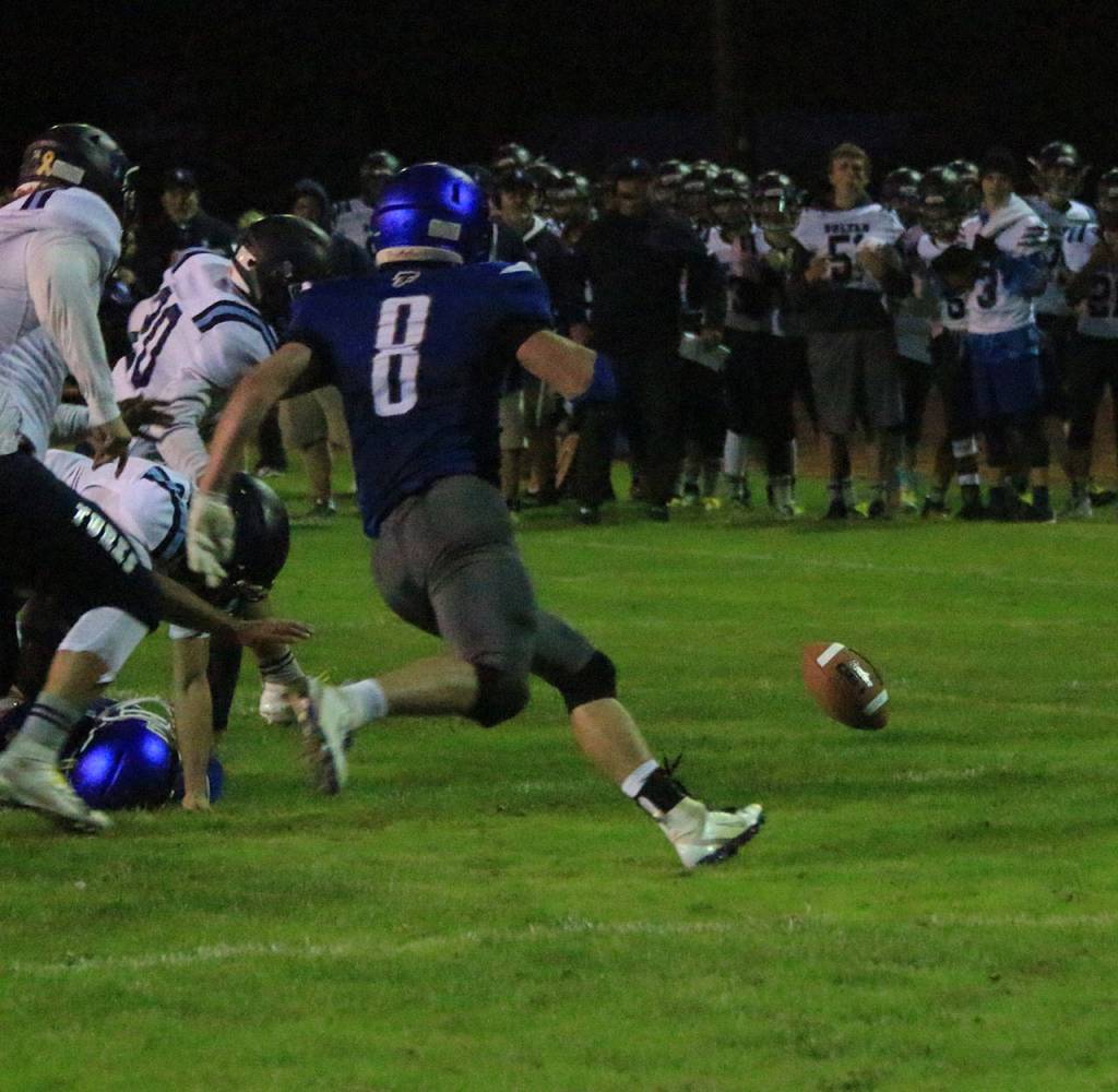 Bodie Hezel (8) hustles to a Sultan fumble.(Photo by Jim Waller/South Whidbey Record)