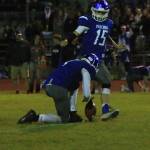 Kole Nelson kicks an extra point for the Falcons.(Photo by Jim Waller/South Whidbey Record)