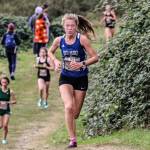 The Falcons Kaia Swegler Richmond heads up a hill on the way to finishing second out of 344 runners in her division. Her time of 18:55.5 is one of the fastest in school history. (Photo by Matt Simms)