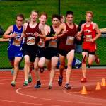 South Whidbeys Michael Harwell, left, nears the finish line in the Hole in the Wall Invitational. Harwell finished 22nd out of 433 in his division. (Photo by Karen Swegler)