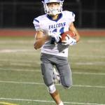 Alex Black picks up some yardage for the Falcons.(Photo by John Fisken)