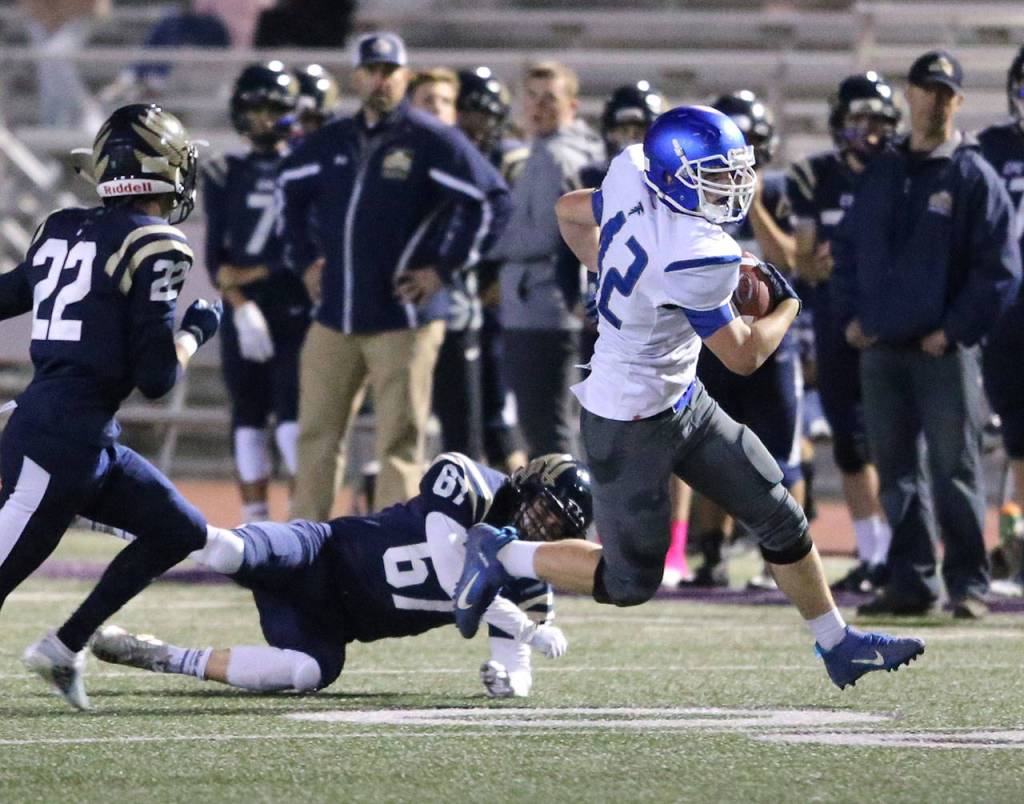 Aiden Coleman turns up field after catching a pass Saturday.(Photo by John Fisken)