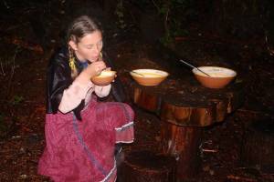 Photo by Wendy Leigh                                Goldilocks eats porridge from three bowls in the Enchanted Forest, an alternative Halloween experience in Clinton that includes surprise characters on a wooded walk.