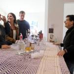 Kathy Stallman, co-owner of Mutiny Bay Distillers, gives visitors a tasting of the companys hand-crafted small-batch whiskeys. Photo by Wendy Leigh / South Whidbey Record