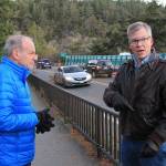 State Rep. Dave Paul, right, and House Transportation Committee Chairman Rep. Jake Fey stand on Deception Pass Bridge Wednesday morning as Paul explains the structures importance. Paul, D-Oak Harbor, gave Fey, D-Tacoma, a tour of areas on Whidbey will high transportation needs such as the intersection of Highway 20 and Swantown and the ferries. Photo by Laura Guido/Whidbey News Group