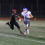 Alex Black returns a kickoff for South Whidbey. (Photo by Jim Waller/South Whidbey Record)