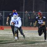 Ryan Morgan (23) looks for running room on a kickoff return.(Photo by Jim Waller/South Whidbey Record)