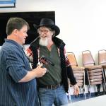 Photo by Laura Guido/Whidbey News Group                                 Jason Blaszkowski, left, and Shawn Cain share a moment during a shoot for their show Scared Stiff.