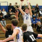 Carson Wrightson (21) was a second-team, all-conference player for the Falcons last winter. (Photo by Jim Waller/South Whidbey Record)