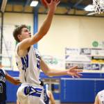 Luke Rookstool scores on a fast break.(Photo by John Fisken)
