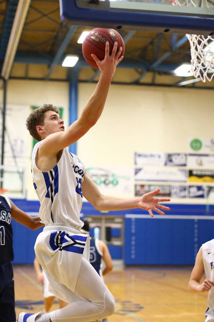 Luke Rookstool scores on a fast break.(Photo by John Fisken)