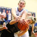 Wolverines use big 2nd quarter to beat Falcons / Girls basketball