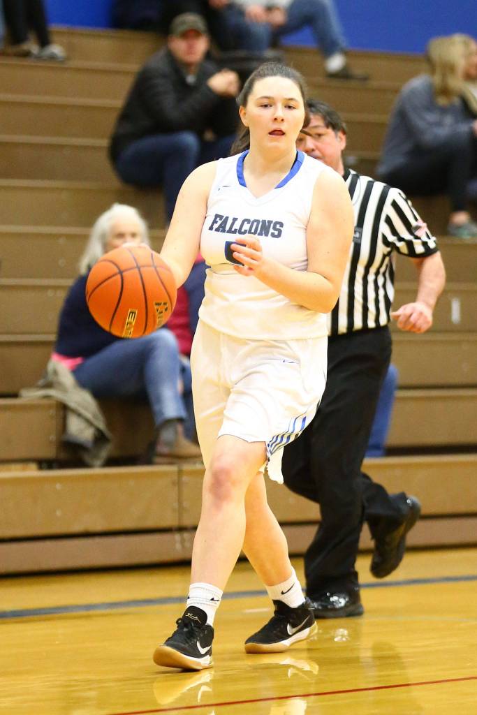 Wolverines use big 2nd quarter to beat Falcons / Girls basketball