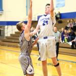 Sterling Patton shoots a left-handed floater.(Photo by John Fisken)