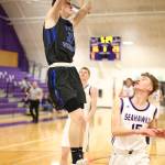 Carson Wrightson dunks on the Seahawks.(Photo by John Fisken)