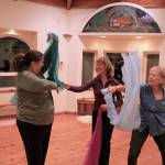 Photos by Kira Erickson / Whidbey News Group                                Deb Helfrich, left, dances with neighbors Kimmer Morris and Jane Klassen, who helped heal her.