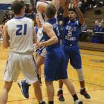 Levi Buck is fouled as he powers to the hoop. (Photo by Jim Waller/South Whidbey Record)