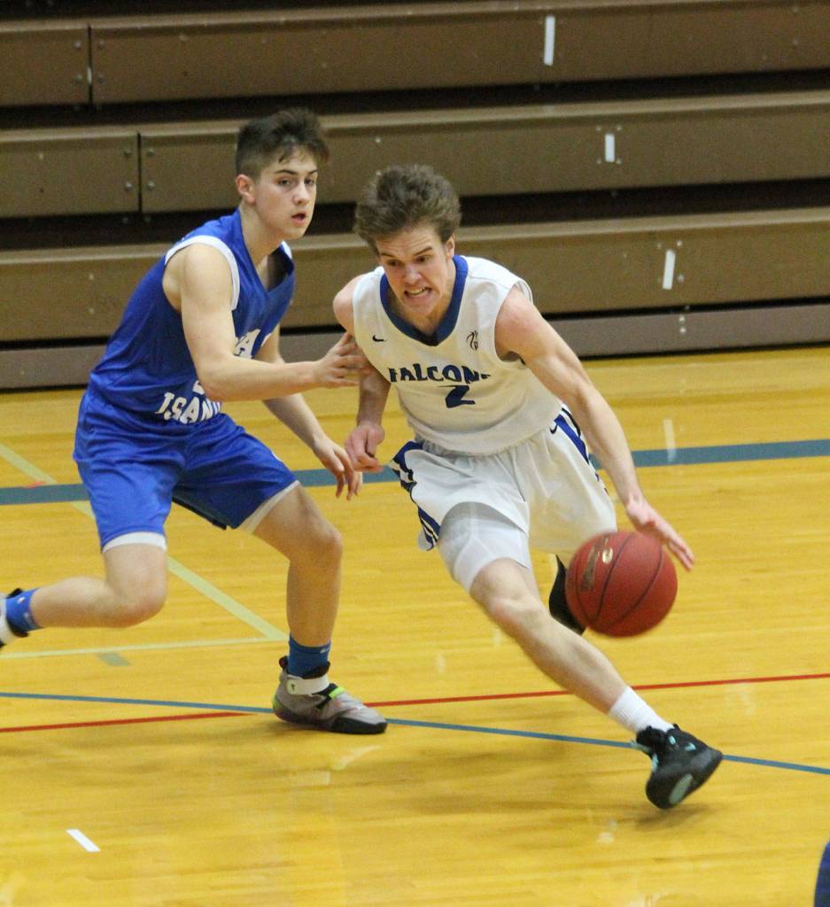Nick Young blows by an Orcas Island defender.(Photo by Jim Waller/South Whidbey Record)