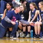 South Whidbey coach Jeff Hanson discusses the Coupeville game with Mary Moss (3).(Photo by John Fisken)