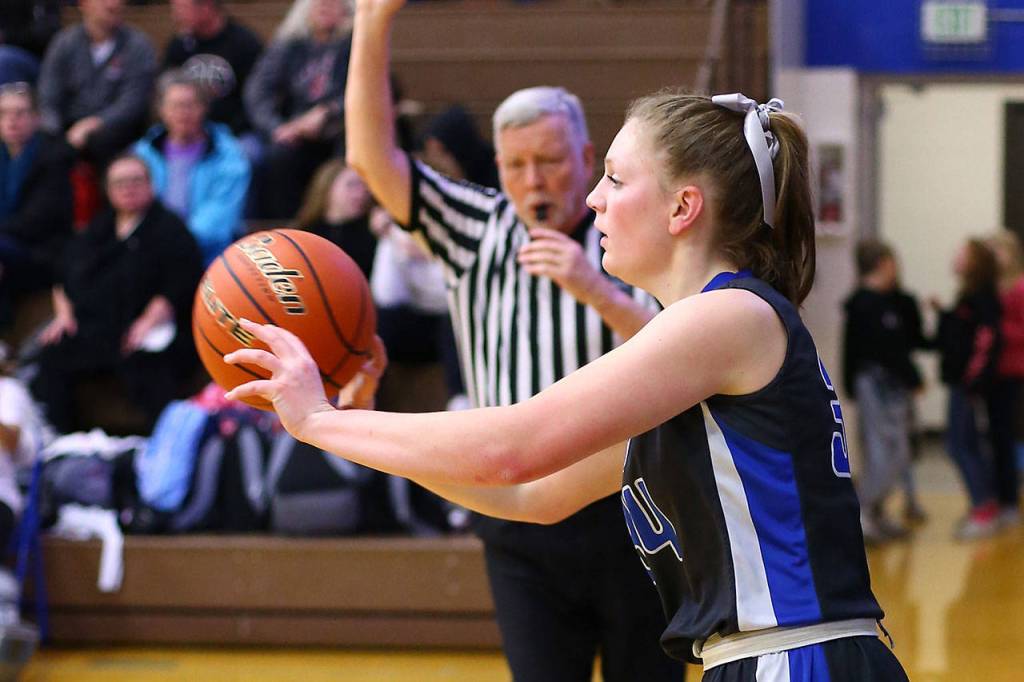Emma Hodson inbounds the ball against Coupeville.(Photo by John Fisken)
