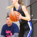 Mary Moss looks for an open teammate.(Photo by John Fisken)