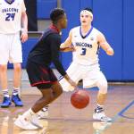 Dexter Jokinen (3) defends Coupevilles Jean Lund Olsen.(Photo by John Fisken)