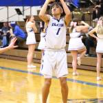 Jacob Ng puts up a shot for the Falcons.(Photo by John Fisken)