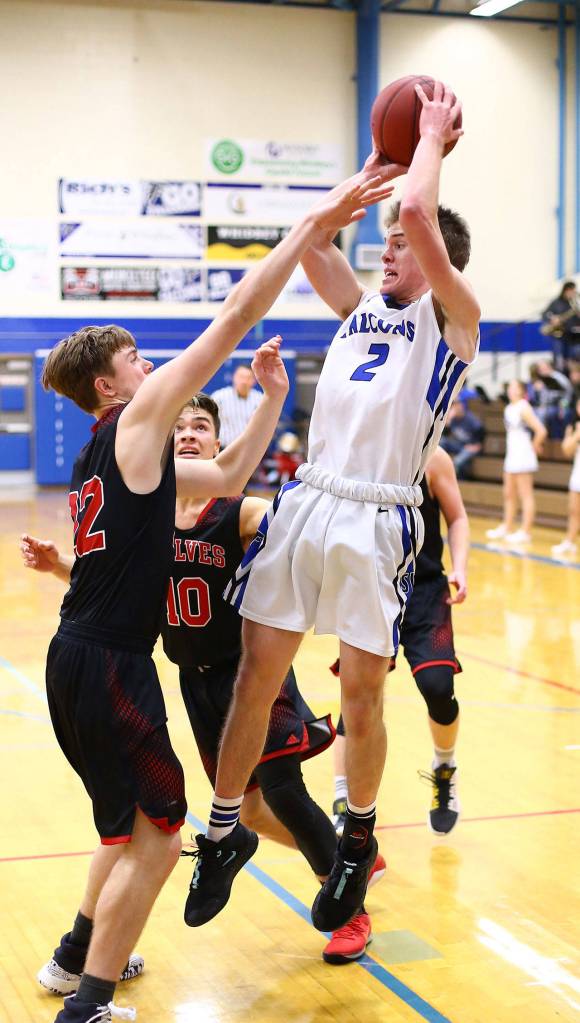 Nick Young, right, shoots a fade-away jumper over Gavin Knoblich.(Photo by John Fisken)