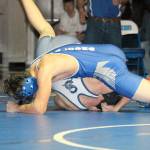 Falcon Dayton Birchfield, top, is about to pin Sultans Donald Bridgewater.(Photo by Jim Waller/South Whidbey Record)