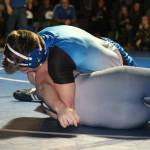 Aiden Coleman, top, turns the Turks Mike Moss.(Photo by Jim Waller/South Whidbey Record)