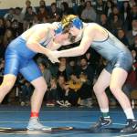 South Whidbeys Magnus Nyberg, left, starts his bout with Kameron Weaver.(Photo by Jim Waller/South Whidbey Record)