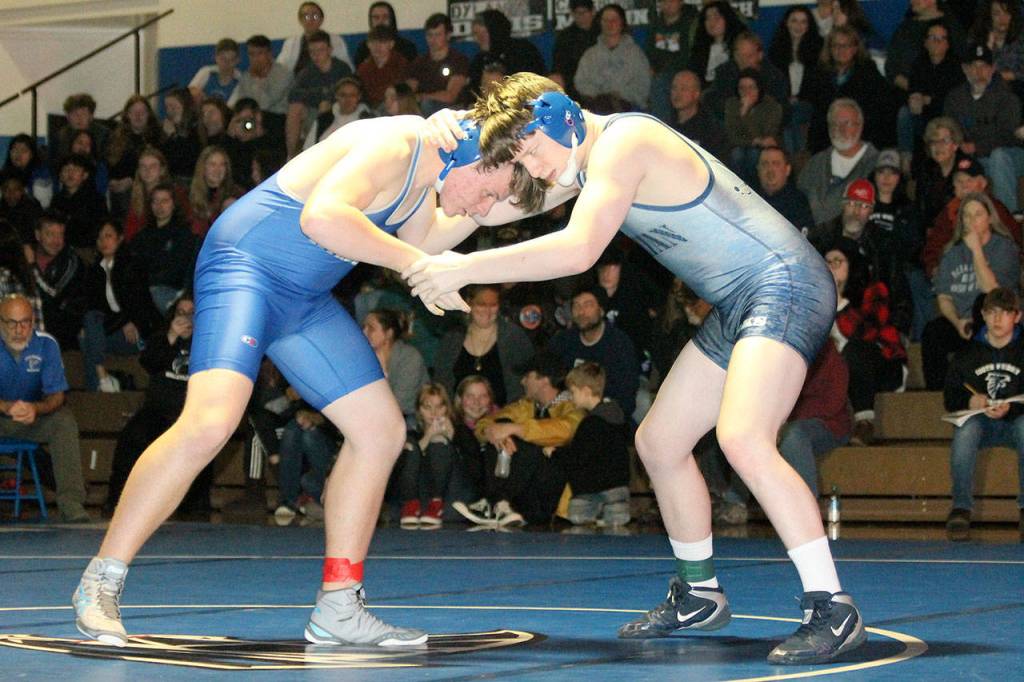 South Whidbeys Magnus Nyberg, left, starts his bout with Kameron Weaver.(Photo by Jim Waller/South Whidbey Record)