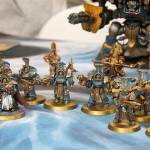 A row of expertly hand-painted miniature models used in a typical game of Warhammer, painted by Jacob Bloom, can be found at Jesters Keep.