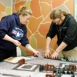 Jesters Keep owners Juliet Dillard and Kyle Casara play their own game of Warhammer.