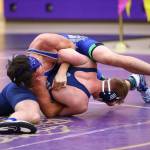Dayton Birchfield, top, turn his opponent.(Photo by John Fisken)