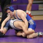 Sawyer Mauk, top, tangles with his opponent Saturday.(Photo by John Fisken)