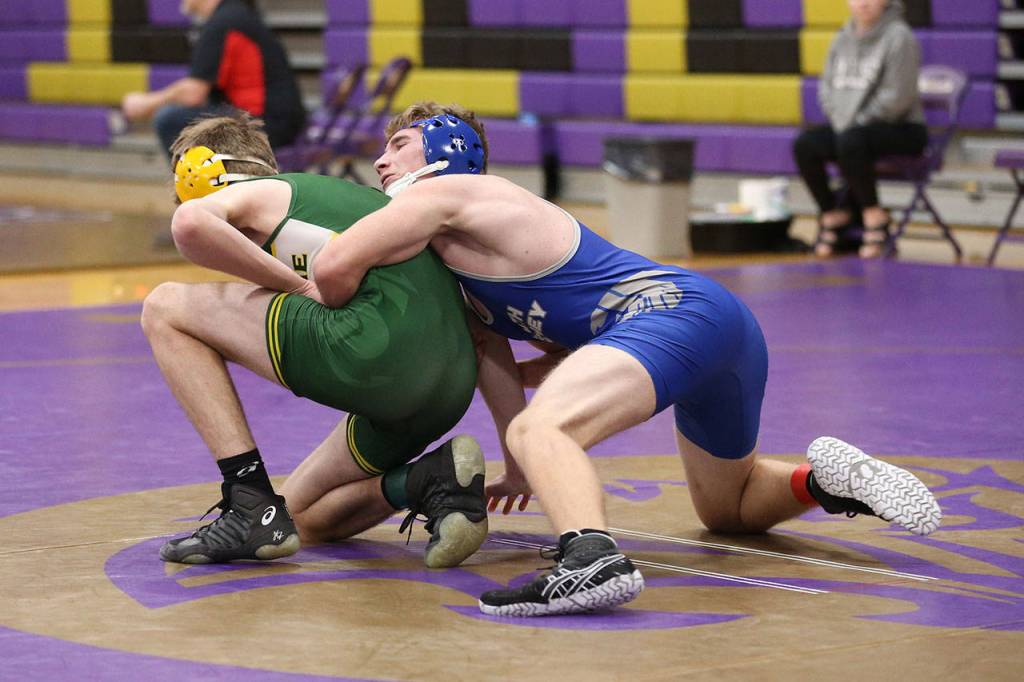 Justin Moberly, right, works to remain in control.(Photo by John Fisken)