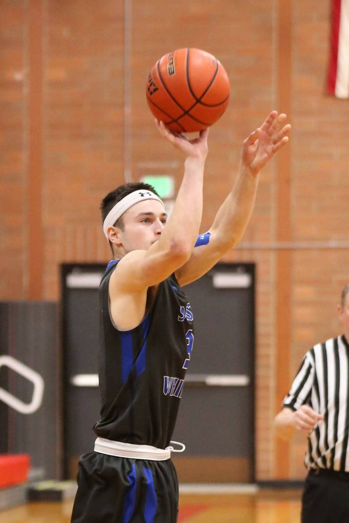 Dexter Jokinen fires up a three-pointer.(Photo by John Fisken)