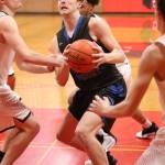 Kole Nelson gets ready to power to the hoop.(Photo by John Fisken)