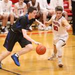 Sterling Patton tries to get around the defense of Coupevilles Sean Toomey-Stout (10).(Photo by John Fisken)