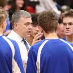 Falcon coach Greg Turcott address his team during a break.(Photo by John Fisken)
