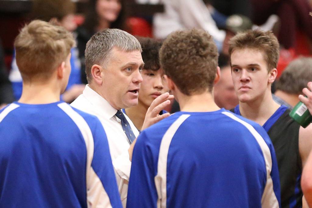 Falcon coach Greg Turcott address his team during a break.(Photo by John Fisken)