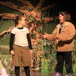 Mowgli (played by June Murray) and Baloo (Corin Boyd) begin their song, The Bear Necessities.
