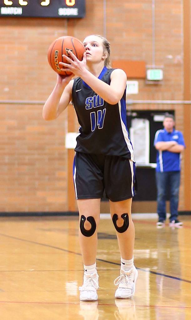 Zoe West launches a three-point shot.(Photo by John Fisken)