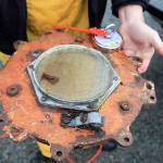 John Norris dragged up an old porthole window from the depths.