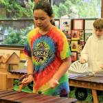 Photo by Kira Erickson/Whidbey News Group                                Eighth grader Josephine Chia, left, and seventh grader Sage Northup play the marimba.