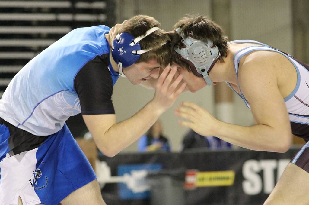 The Falcons Aiden Coleman, left, squares off with Stevensons Tristen Turner. (Photo by Sarah Manchester)