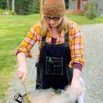 Photo provided                                Jess Dowdell, owner of Roaming Radish catering, grills over a fire.