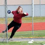 Mya Pratt gets ready to release the discus. (Photo by Jim Waller/South Whidbey Record)